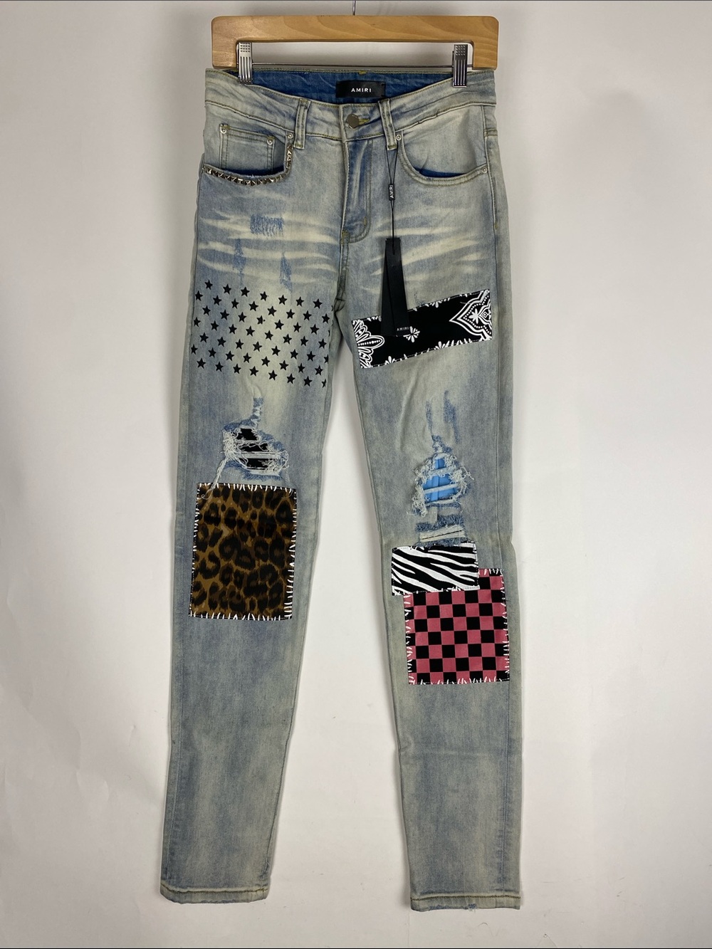 AMIRI Light Blue Patchwork Skinny Jeans with Mixed Print Patches